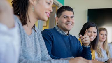 A diverse office meeting.