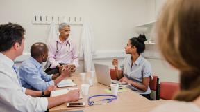 A diverse meeting of doctors.
