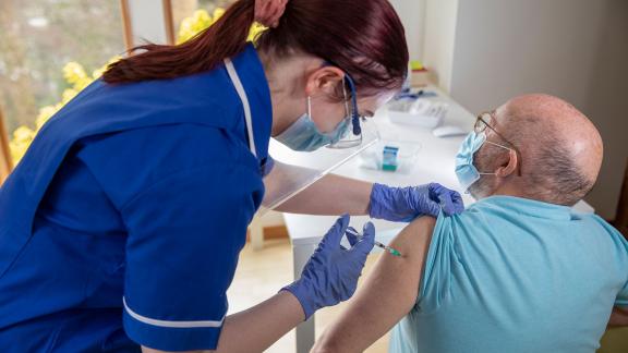 A patient receiving a COVID-19 vaccination.