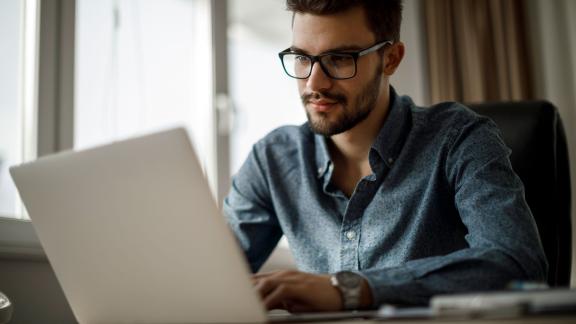 A homeworker using a laptop.