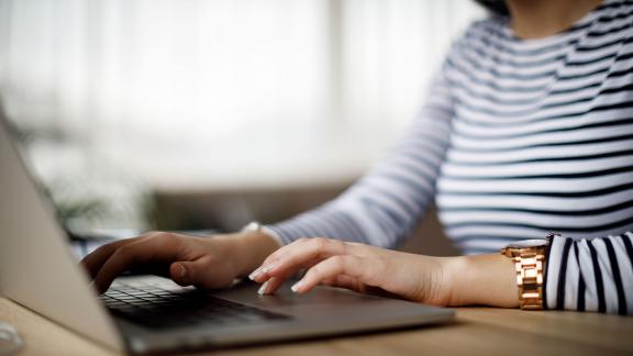 A homeworker using a laptop.