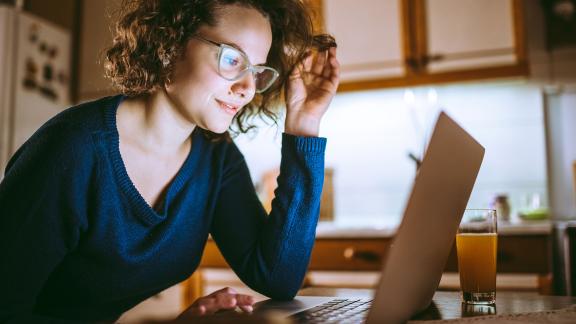 A woman working from home.