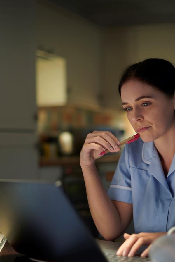 Banner of nurse at a computer