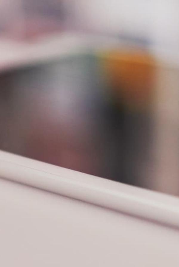 Image of a tablet on a white table