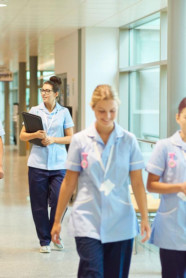 Student nurses in a corridor