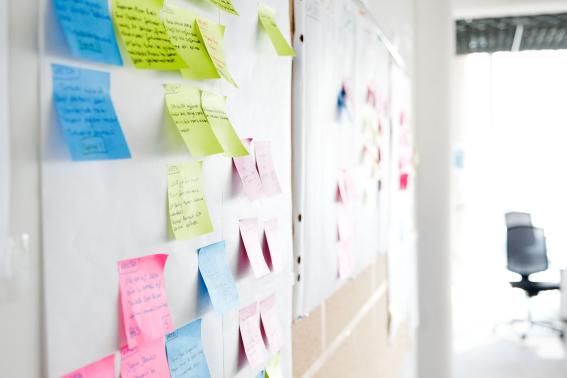 Post-it notes on a wall.